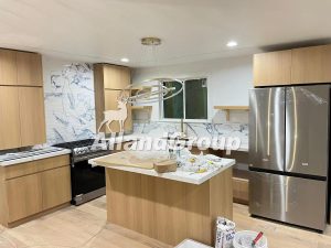Completed MDF kitchen cabinets installed in a US multifamily development project