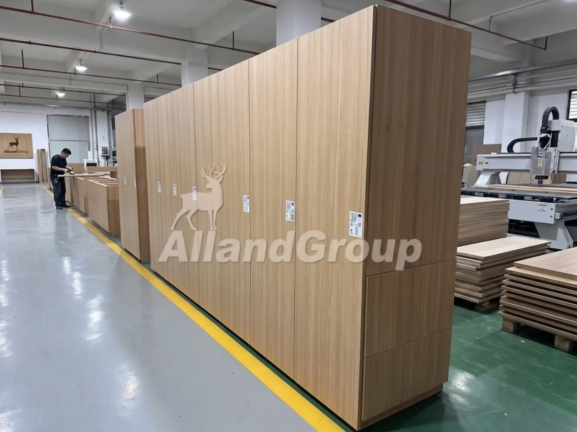 High-end cabinetry featuring sequence-matched white oak veneers, showing a continuous and harmonious grain flow across multiple cabinet panels.
