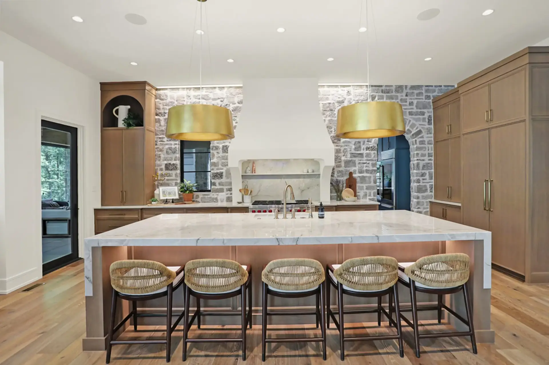 Technical view of slim shaker rift sawn white oak kitchen cabinets with architectural plaster hood and stone walls.