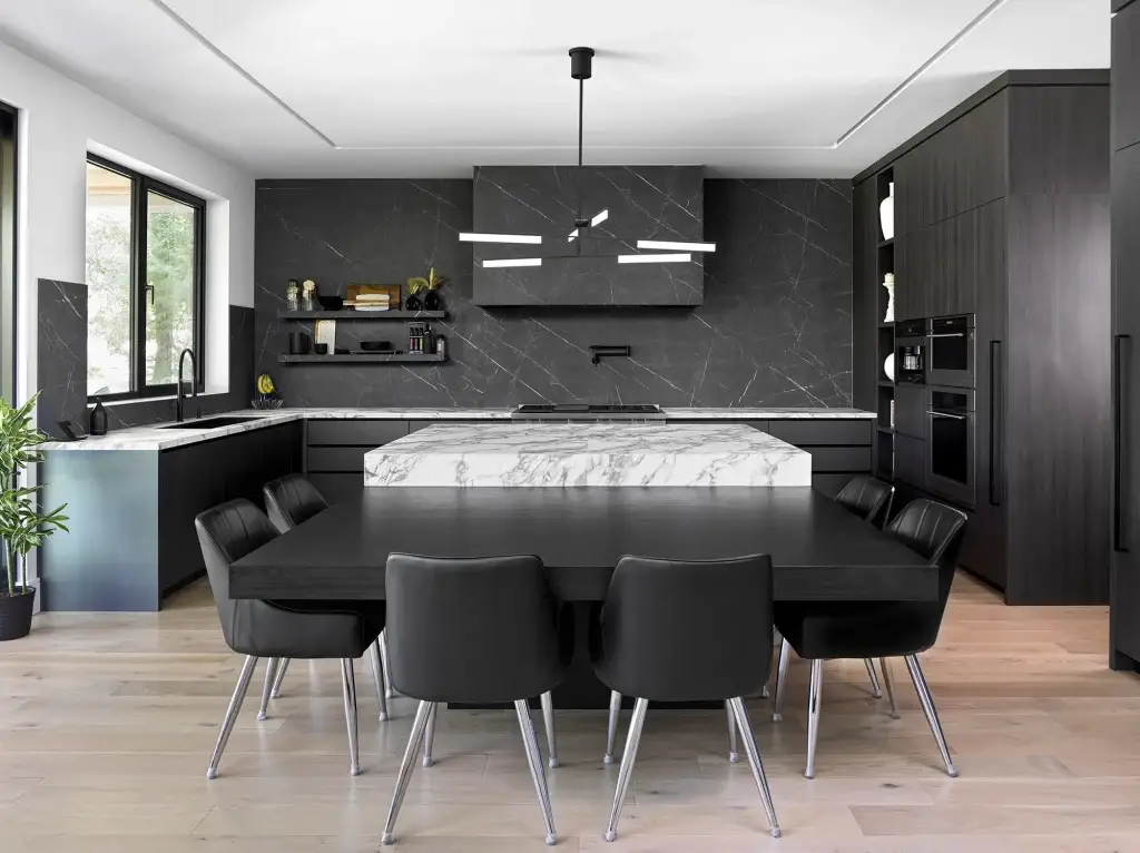 Luxury great room perspective showcasing a high-capacity black cabinets kitchen array with an integrated black oak dining suite.