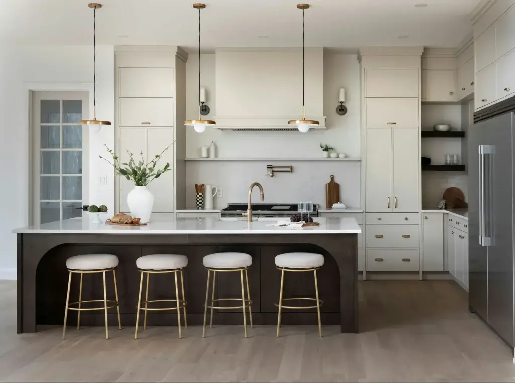 Wide perspective of a scullery utility room built with creamy beige kitchen cabinets and a farmhouse apron sink.