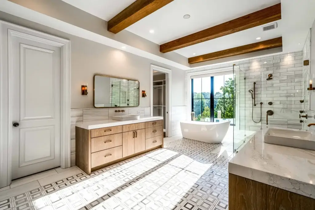 His and hers bathroom vanity layout showing opposing white oak casework, freestanding tub, and timber beams