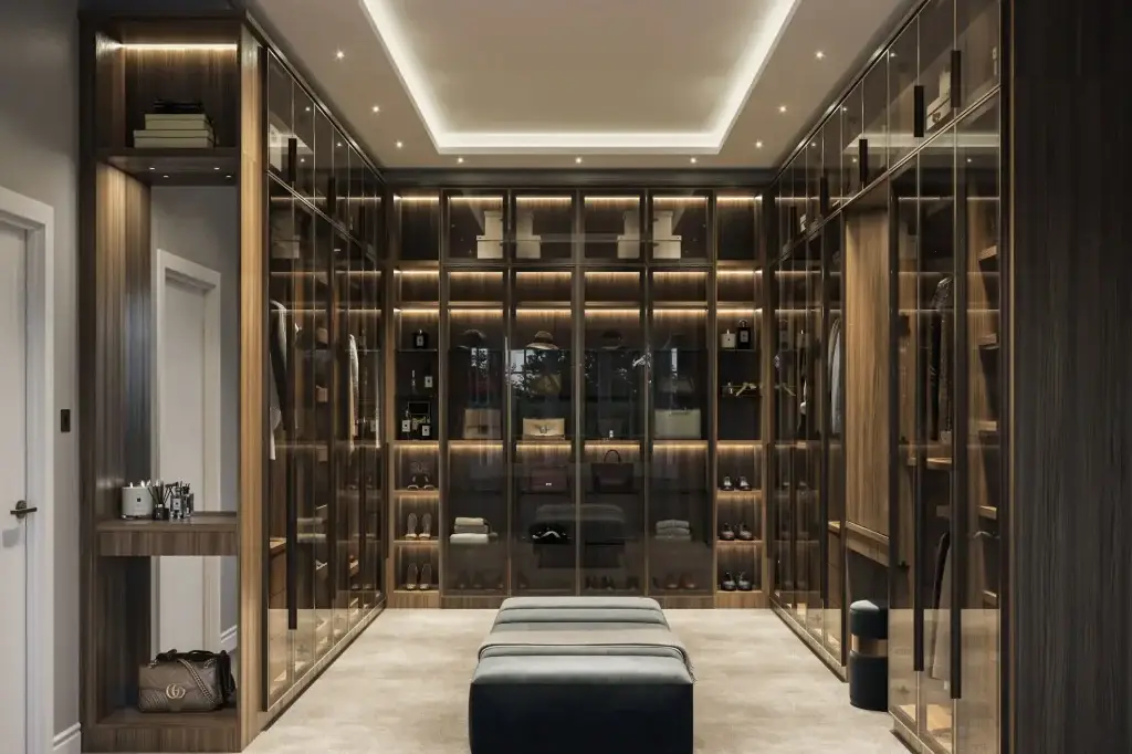 Luxury glass door walk-in closet system with ultra-slim aluminum profiles and integrated interior lighting