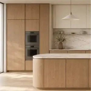 Modern organic minimalist kitchen cabinets featuring curved islands and tall pantry units