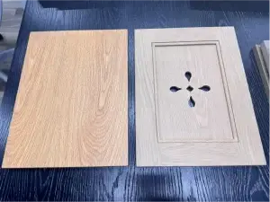 Architectural veneer vs solid wood cabinets comparing modern flat slab door and 5-piece shaker frame samples