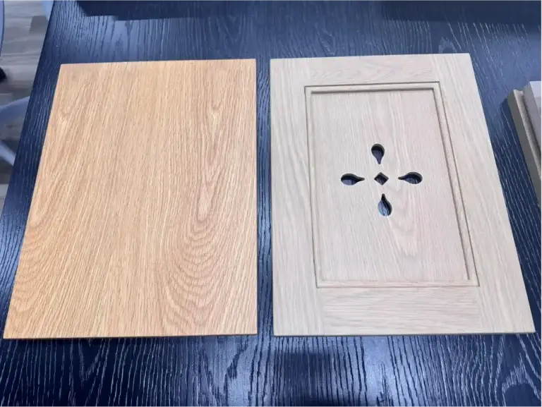 Architectural veneer vs solid wood cabinets comparing modern flat slab door and 5-piece shaker frame samples