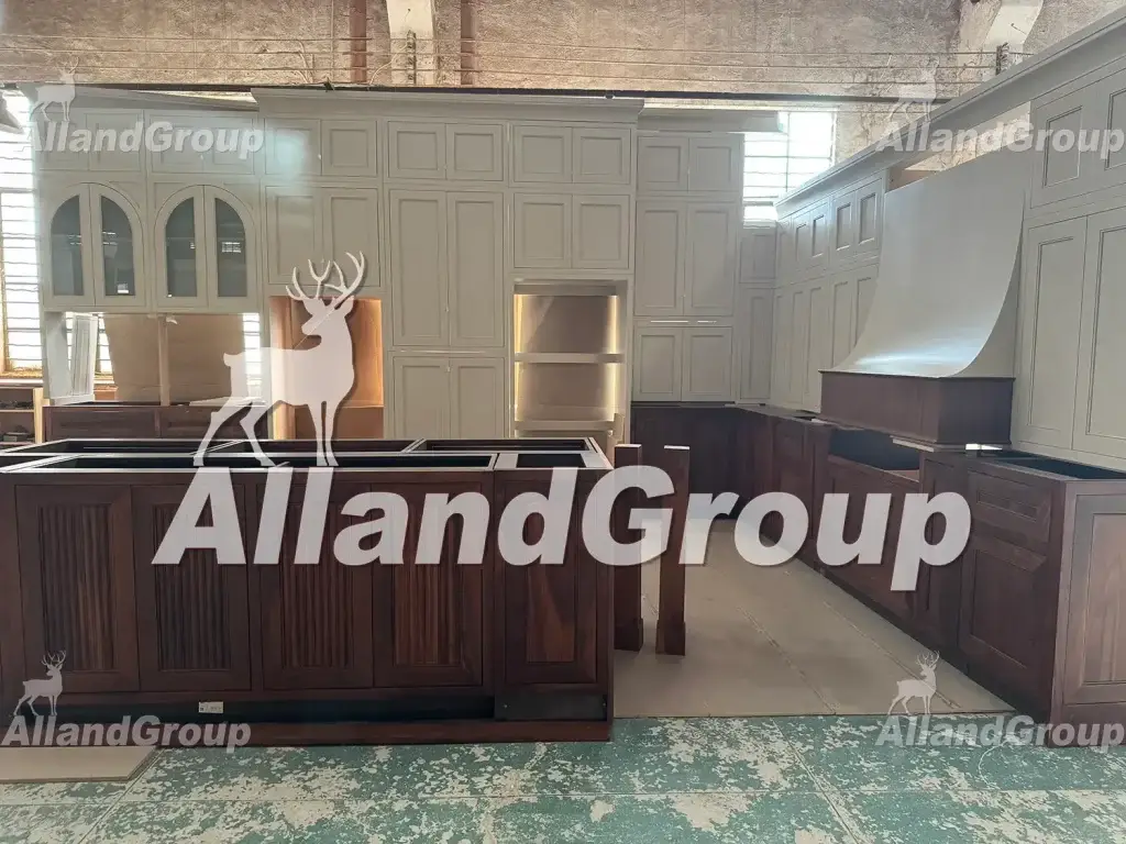 Full workshop dry-fit assembly and reveal inspection for custom walnut island and perimeter cabinetry by ALLAND