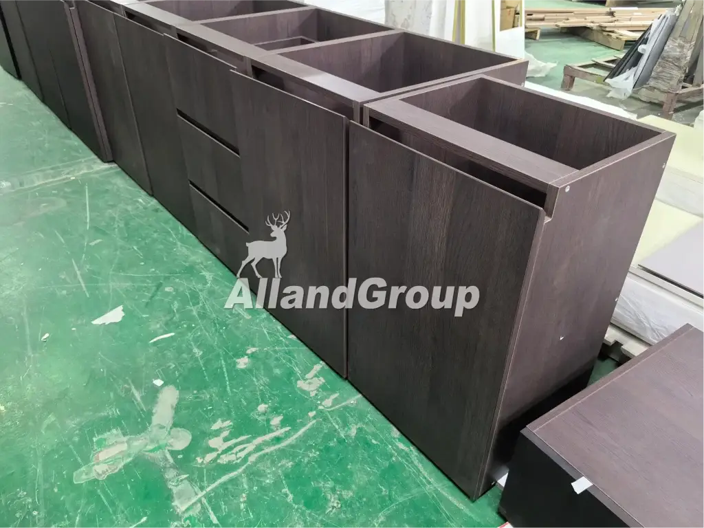 Factory dry-fit assembly of wood veneer kitchen cabinet base boxes with handleless profile